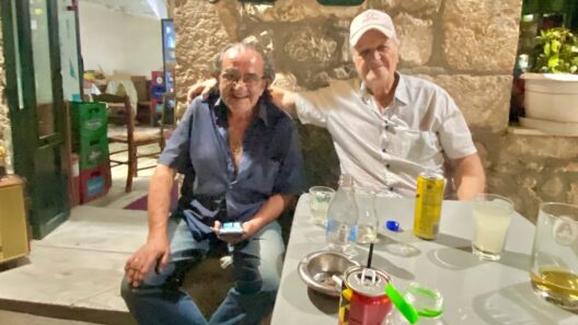 Friends enjoying a relaxed evening with food and drinks in Richea