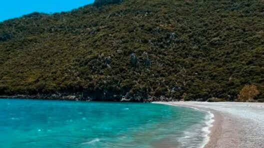 Turquoise water and a quiet beach featured in the Instagram Reel